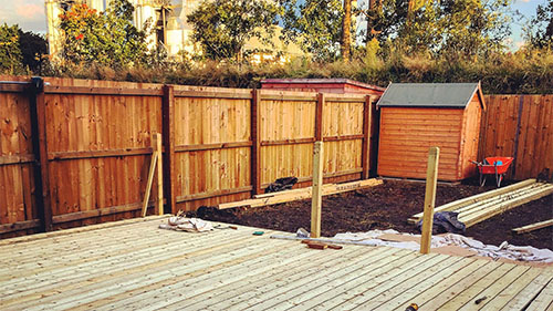 Why Hiring a Pro for Your Wood Fence Installation Saves Time & Trouble