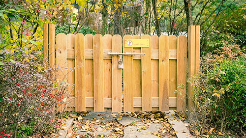 How to Enhance Your Outdoor Living Space with a Custom Wood Fence
